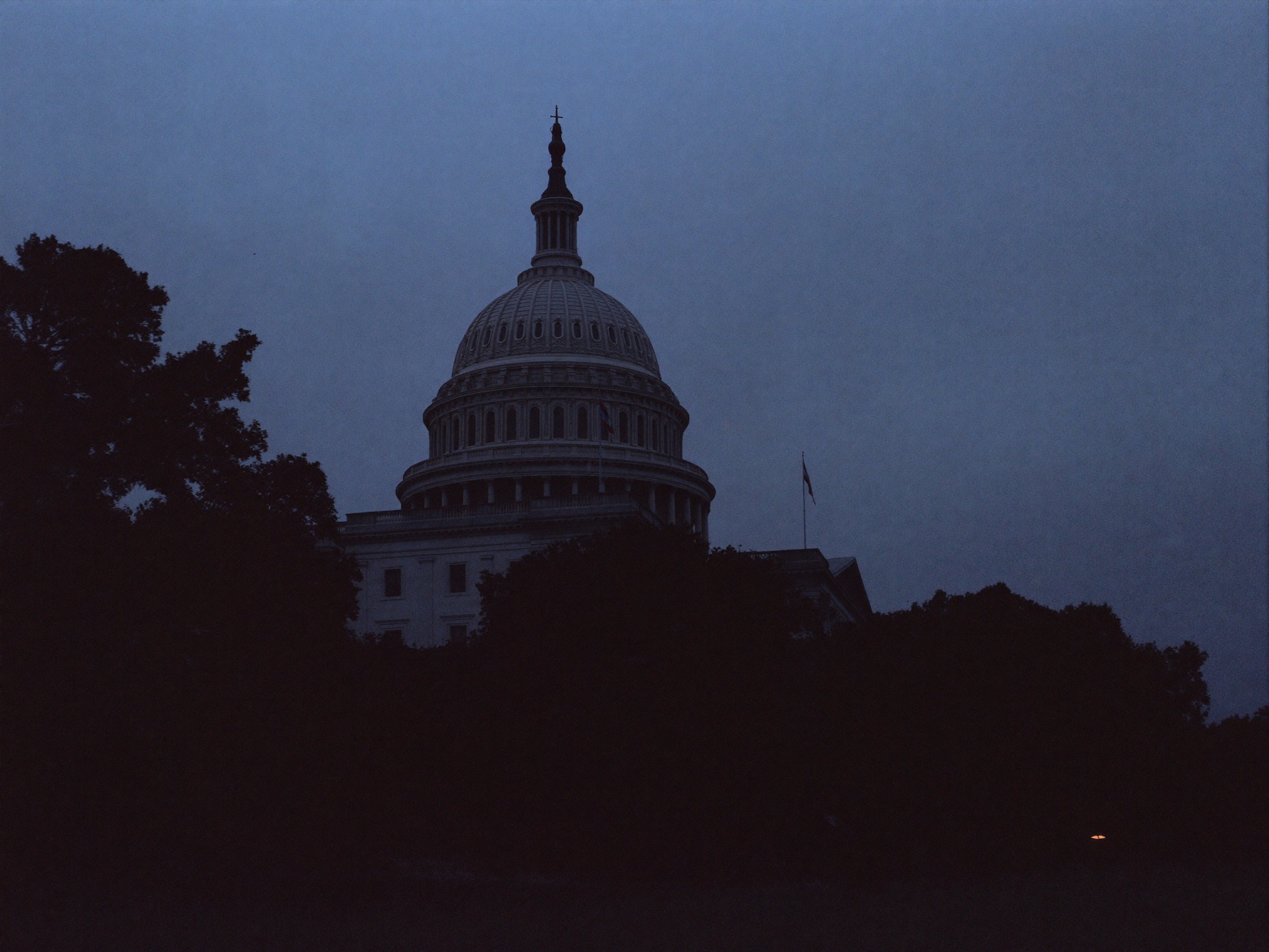 The United States Capitol dome at dusk