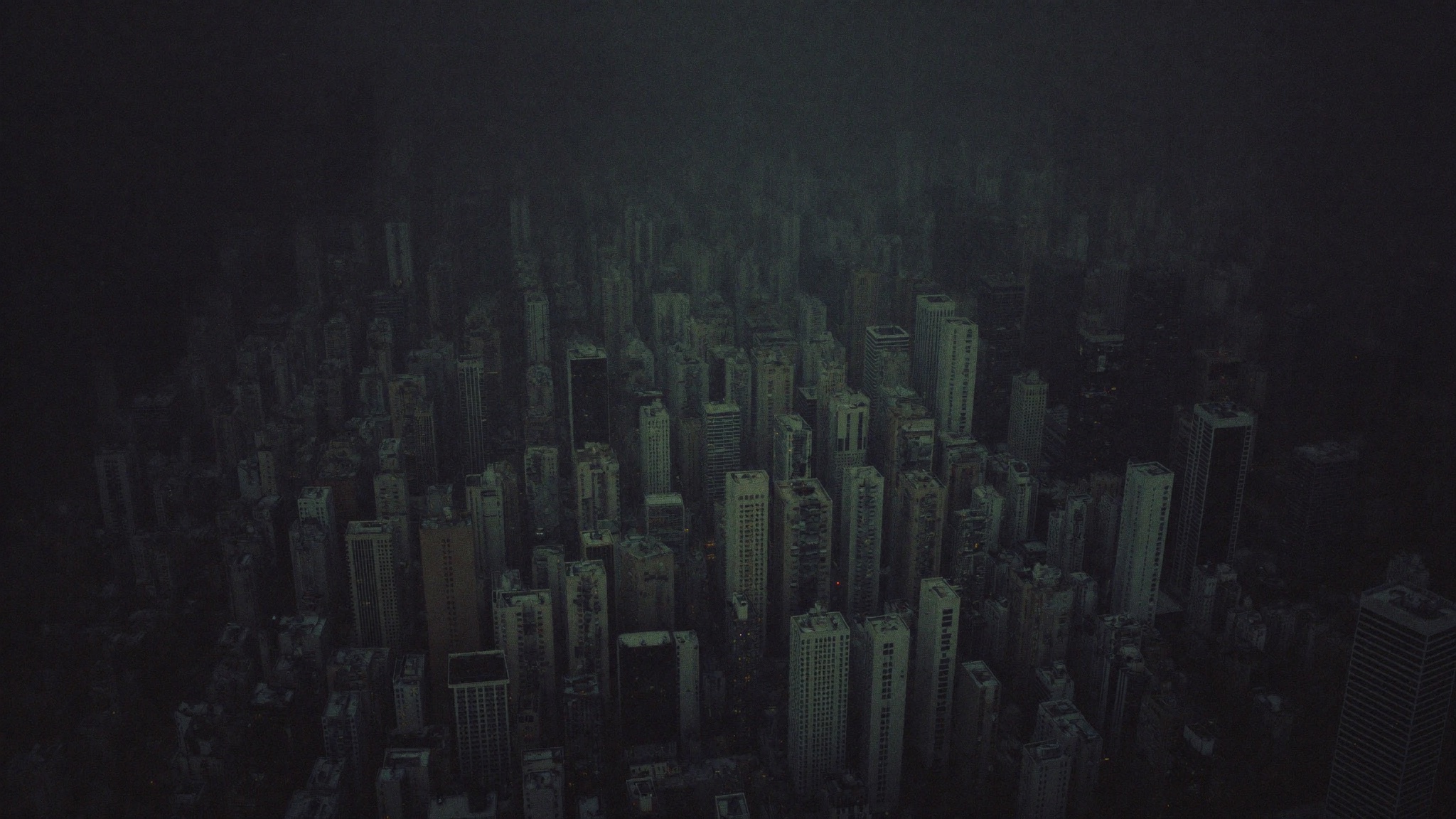 Aerial night view of a dense financial district